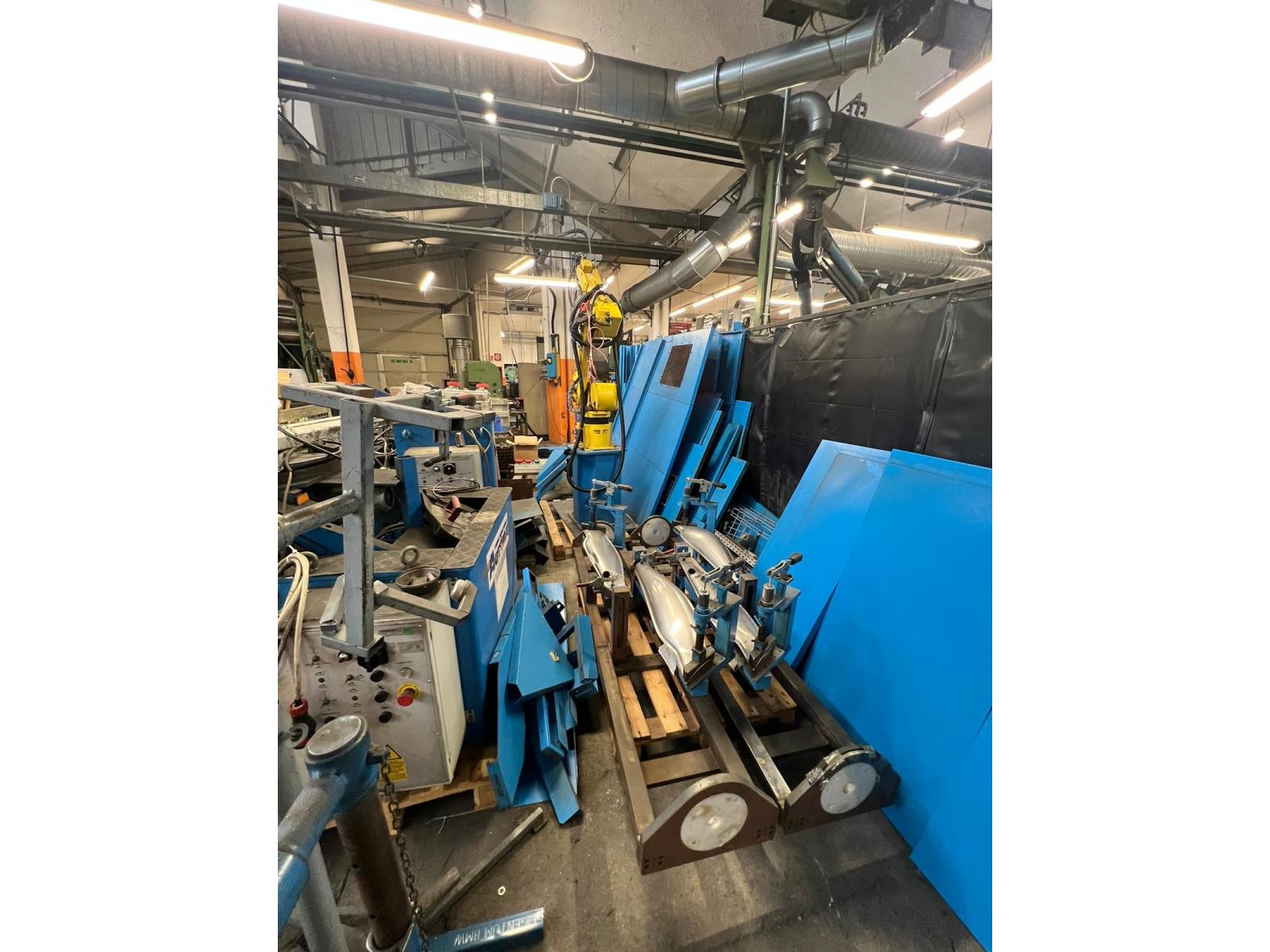 IMPIANTO DUAL ARM CON ROBOT FANIC